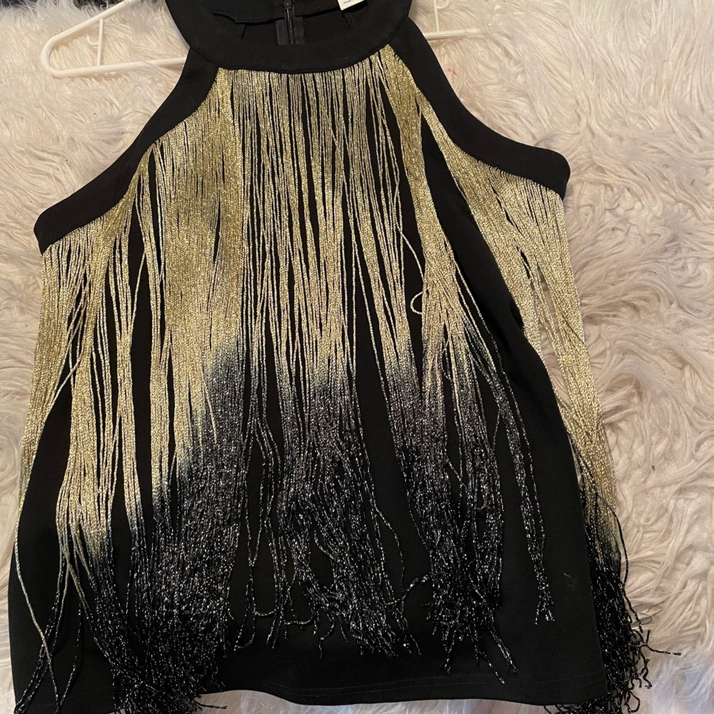 Really cute top with lots of fringe.